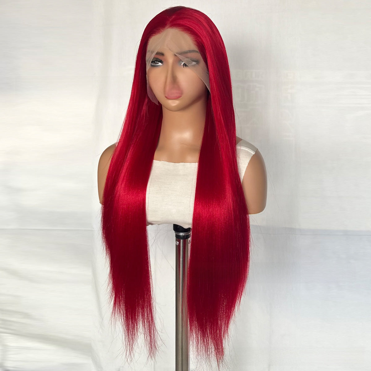 Long straight Neptune red synthetic lace front wig front view on a mannequin head