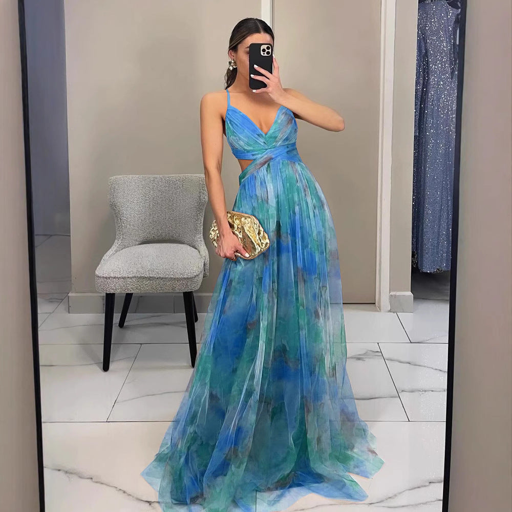 Mesh print sling maxi dress shown at an angle to show the printed fabric