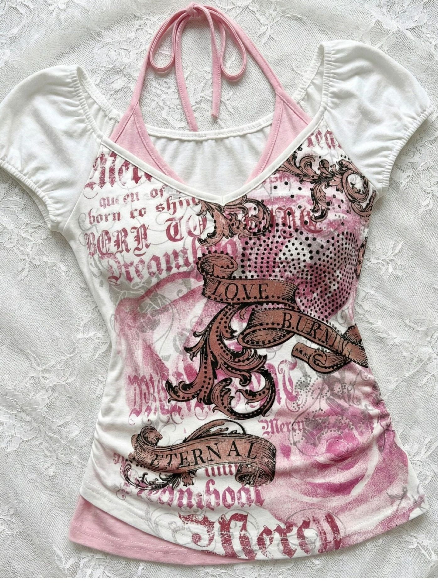 White combed cotton halter tee with a beaded baroque graphic and gothic lettering