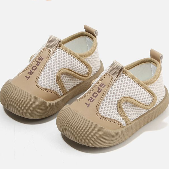 Pink toddler breathable mesh slip on sports shoe on a plain background showing the light single layer build