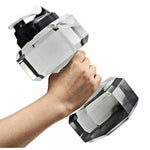 Translucent PET dumbbell shaped sports water bottle held in one hand like a hand weight