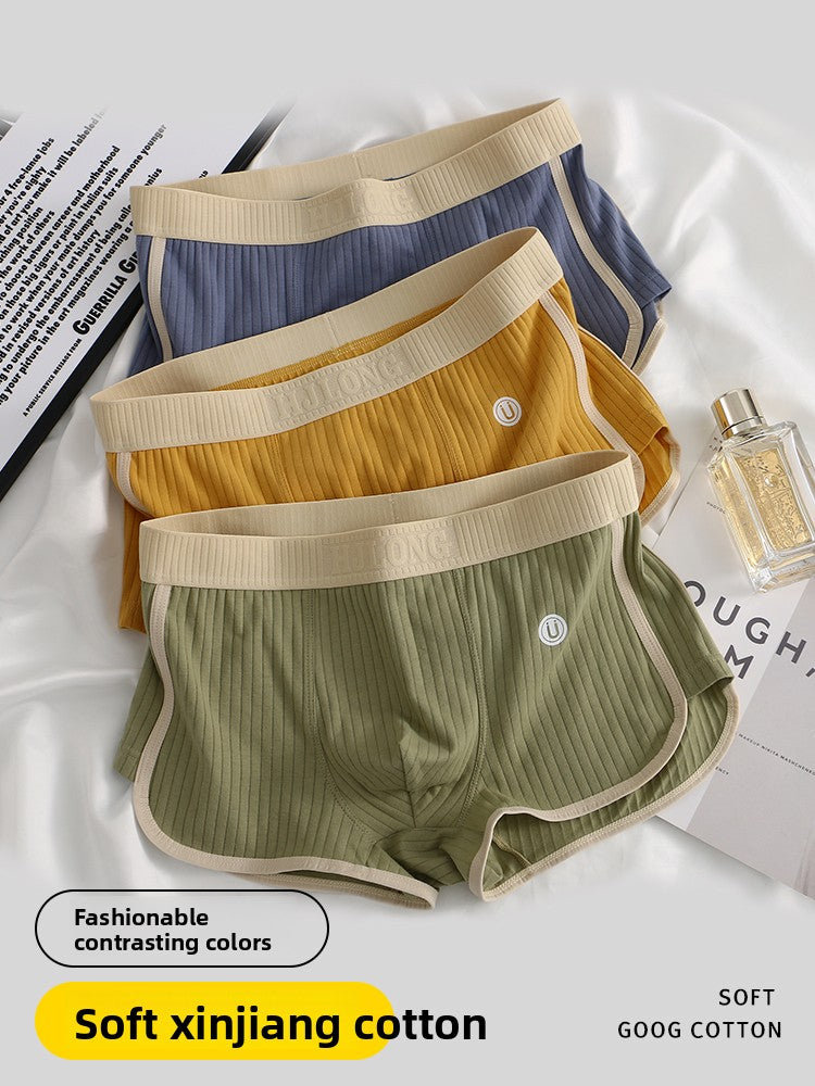 Men's ribbed cotton boxer briefs flat lay in a contrasting colour on soft fabric