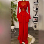 Red long sleeve maxi dress on a mannequin with twisted bust band and draped front tie, full length view