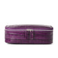 Purple crocodile pattern leather cosmetic bag, front view with double zipper on a white background
