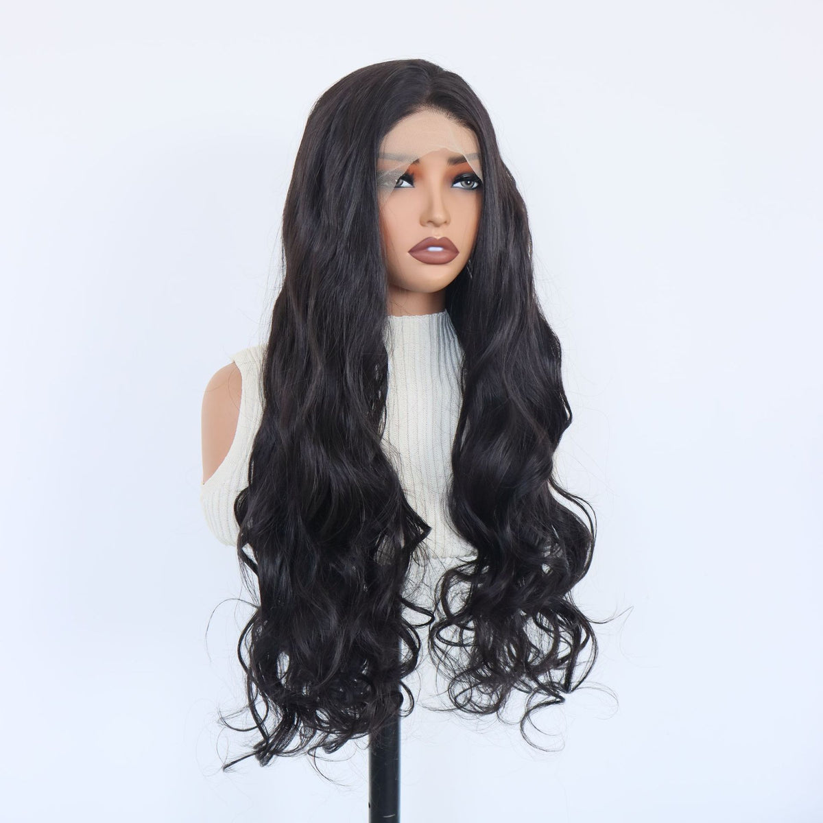 Three quarter view of a long black wavy synthetic lace front wig on a mannequin