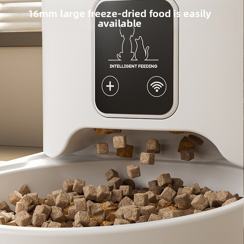 Black and white automatic pet feeders shown side by side with clear bins