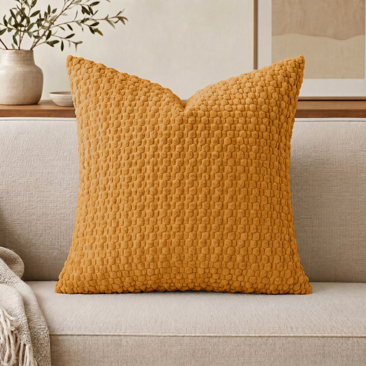 Plush bubble grain cushion cover with an even field of raised loops