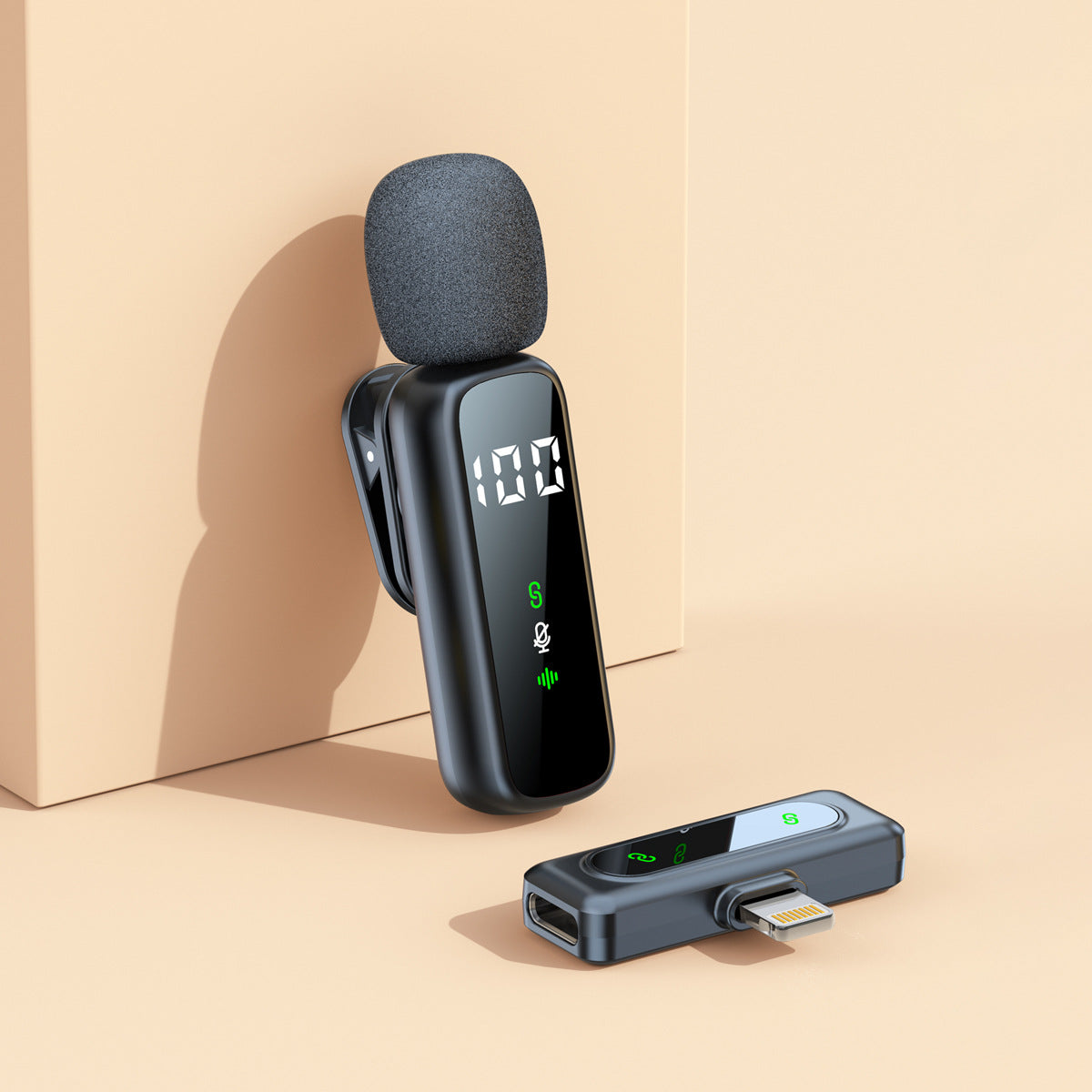 Single wireless lavalier clip mic with a Lightning receiver on a beige background