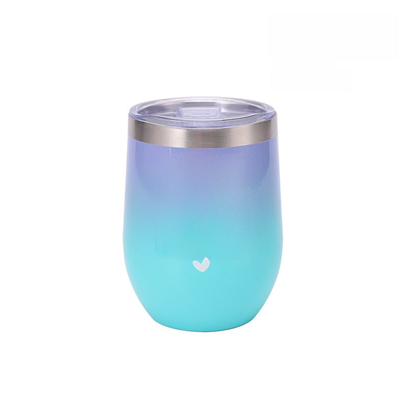 Stemless insulated stainless steel tumbler in a deep color finish with a clear press-on lid