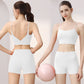 Woman in a white V-back sports bra and high-waist shorts set holding a pink ball, back and front views