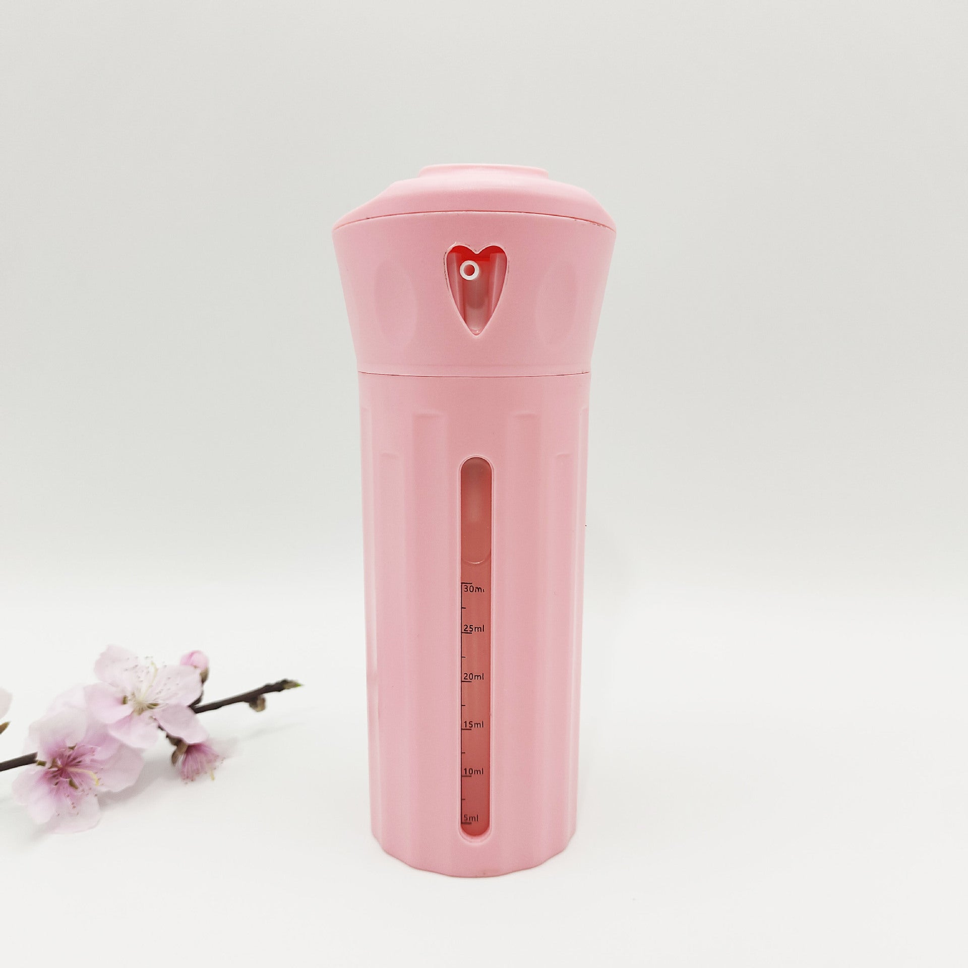 Travel bottle case twisting to reach each refillable section shown in hand