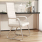 High back ivory leather cantilever conference chair, latex seat, fixed armrests and chrome frame in an office