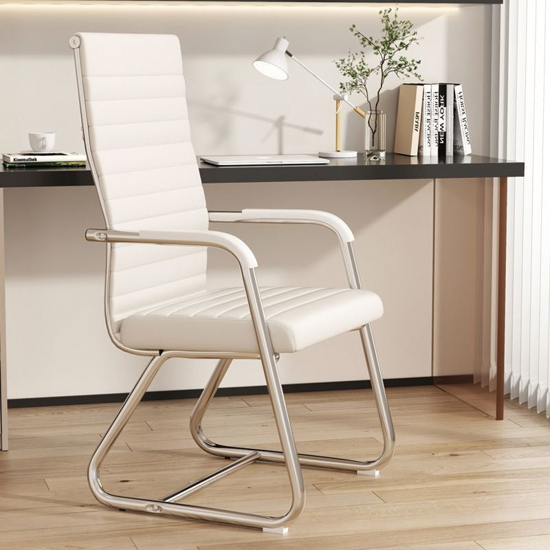 High back ivory leather cantilever conference chair, latex seat, fixed armrests and chrome frame in an office