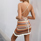 Multicolour zigzag knit mini dress with a drawstring ruched side and white ruffle hem, front view