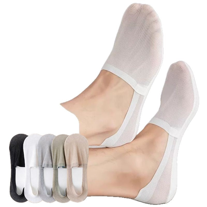 Invisible low cut mesh boat socks lined up in several solid colors on a plain background