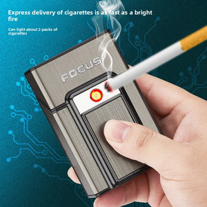 Hand holding an aluminum cigarette case while its front coil lights a cigarette tip