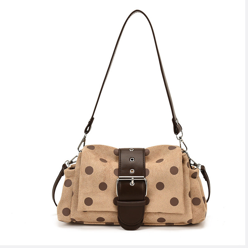 Beige polka dot shoulder bag with brown dots and brown buckle band, shown for the Khaki option
