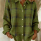 Green option photo of an olive green knit cardigan with a dark plaid check, shirt collar, size XL