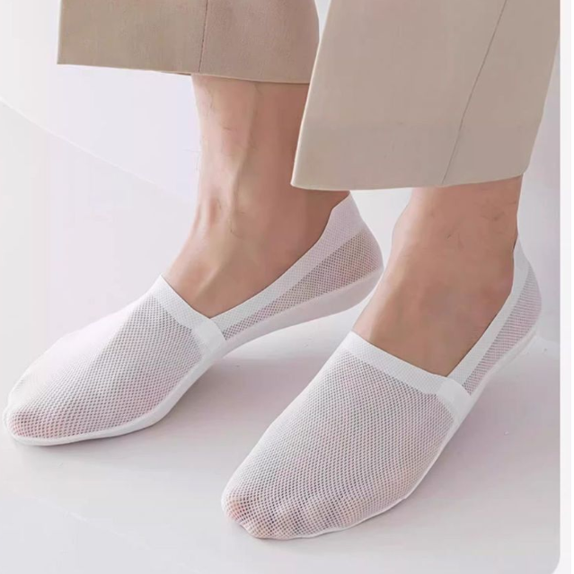 Mesh no show socks worn under low shoes so the sock stays hidden below the shoe line