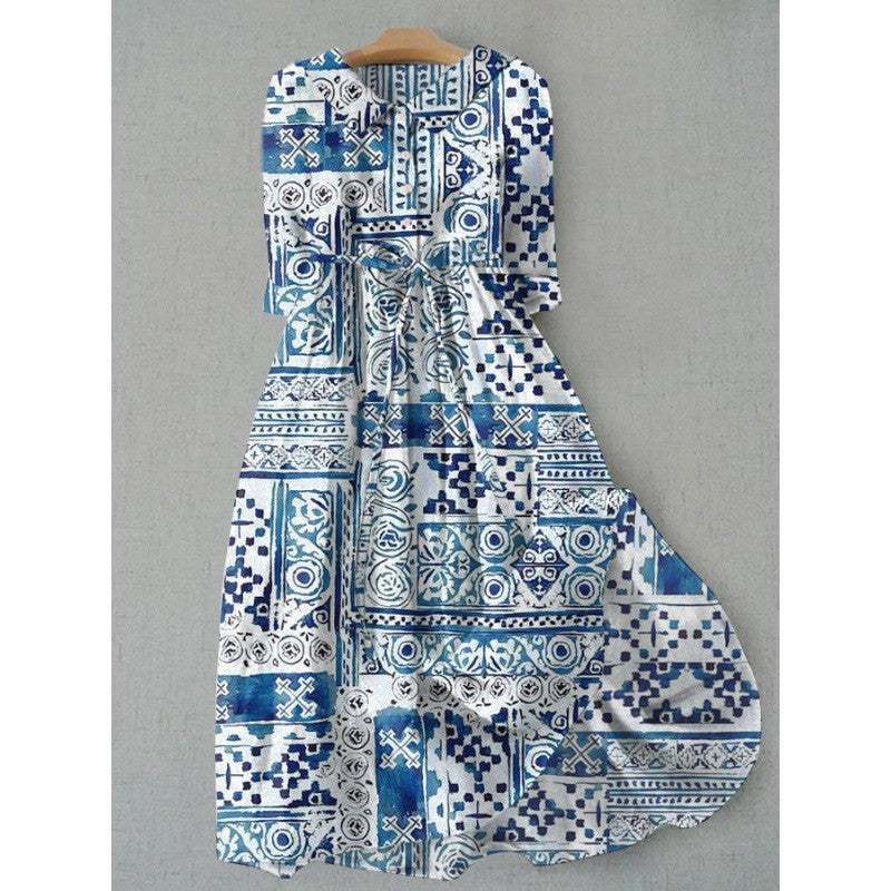 Doll collar floral dress showing the painterly flower print across the full skirt
