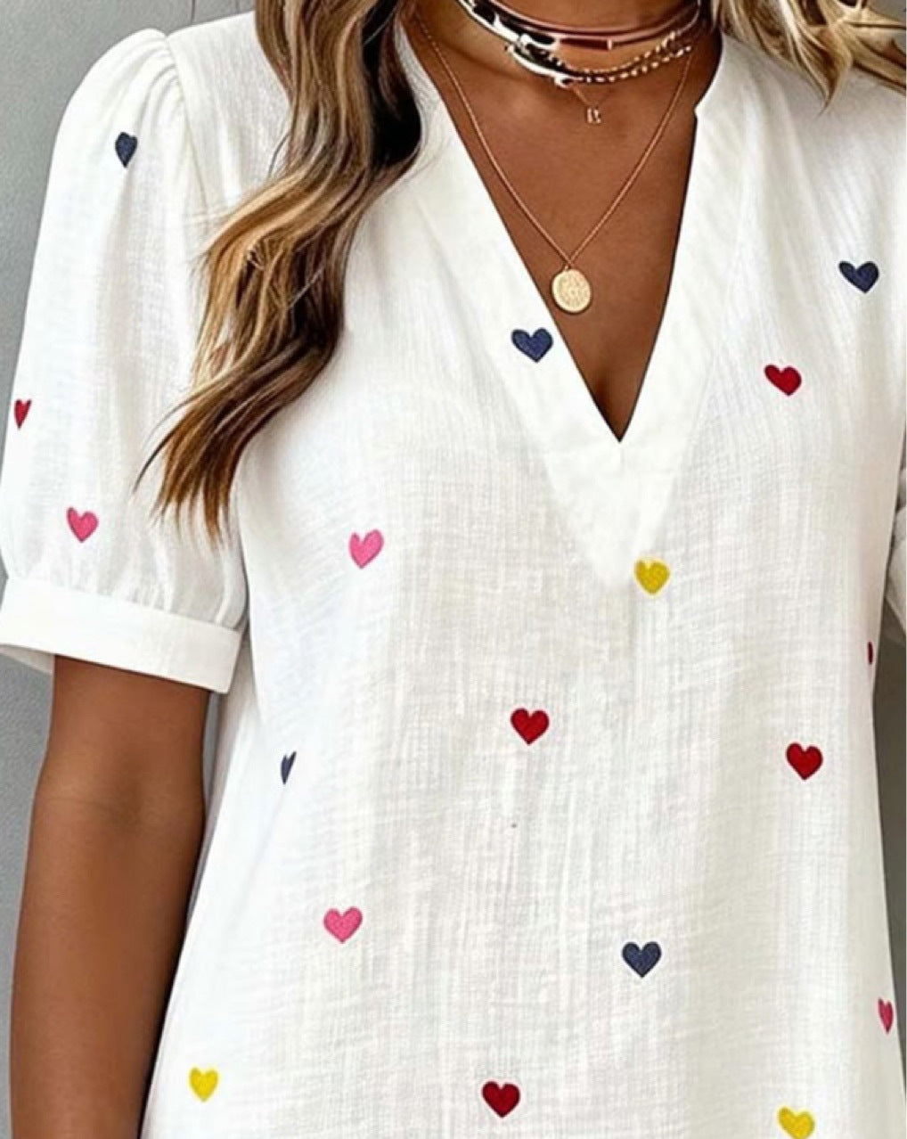 Printed dress laid flat top-down to show the all-over print pattern