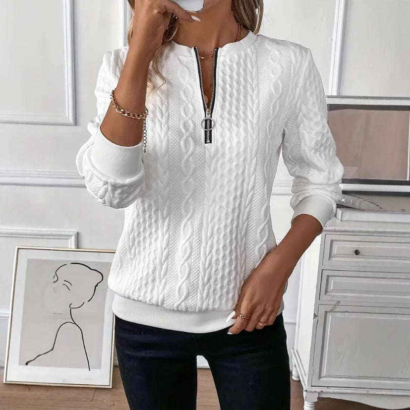 Womens cable knit quarter zip pullover with a mock neck and ribbed cuffs, front view
