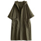 Close detail of the attached hood and collar on the loose fit long coat