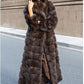Long brown hooded vegan fur coat, option photo for size S, worn with black boots