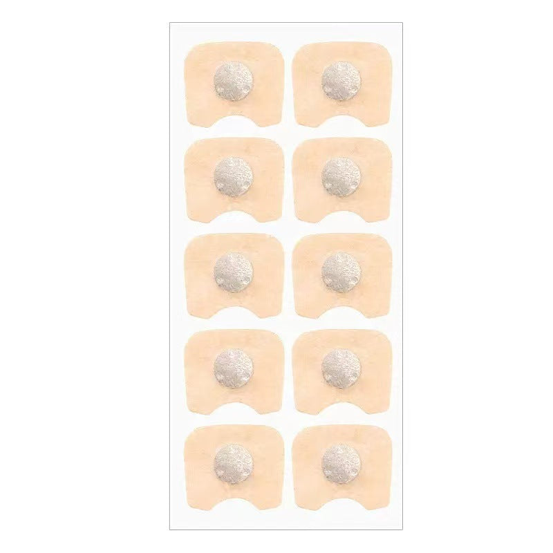 External nasal dilator clip positioned on the nose with the magnetic patches in place