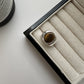 Polished S925 silver band with a golden brown tiger eye stone