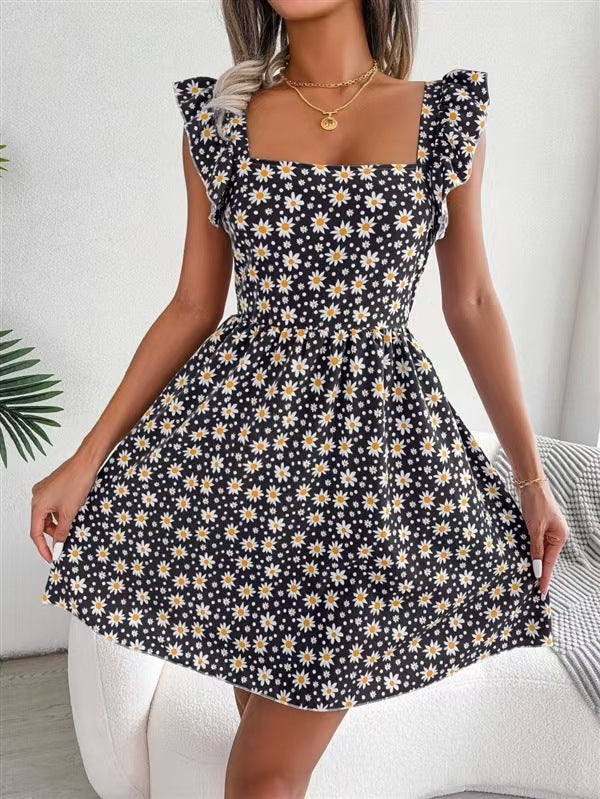 Floral square neck ruffle strap tie back mini dress shown flat, three quarter view