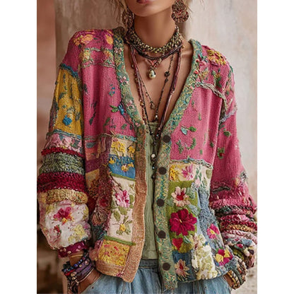 Women's V neck button front knit cardigan in the Pink Floral Patchwork print worn open over a white top