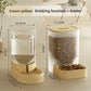 Gravity pet feeder and waterer combo shown from above on a wood floor