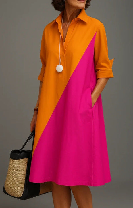 Orange and Pink Color Block polyester shirt collar long sleeve A-line midi dress on a standing model