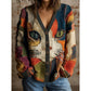 Women's V neck button front knit cardigan in the Cat Face Patchwork print worn open over a white top
