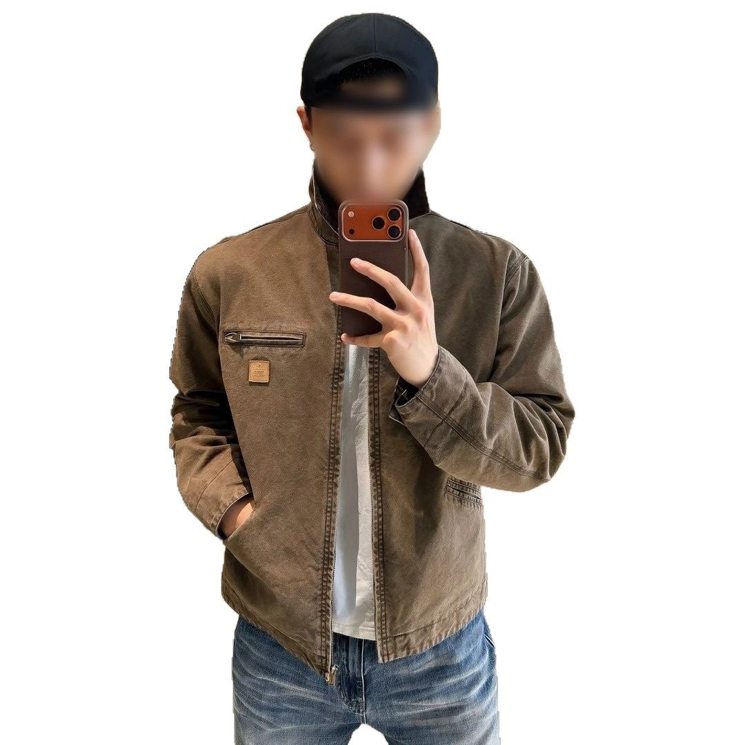 Brown washed cotton jacket with a center zip, chest zip pocket and square patch label on a white background