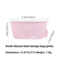 Reusable pink silicone food storage bag, 400ml size, standing sealed upright
