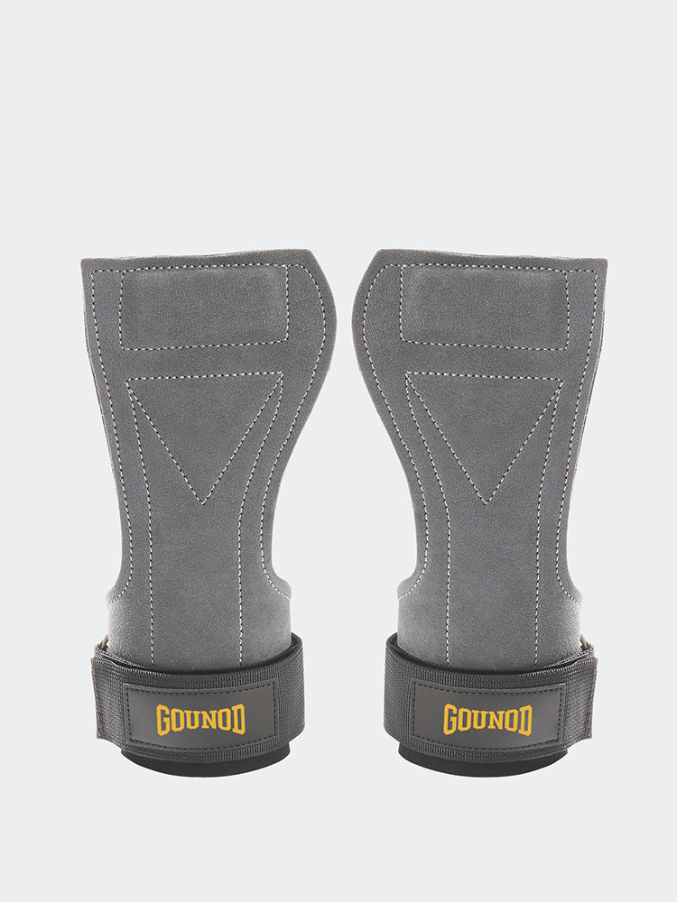 Leather palm pad of a gym hand grip shown against a white background