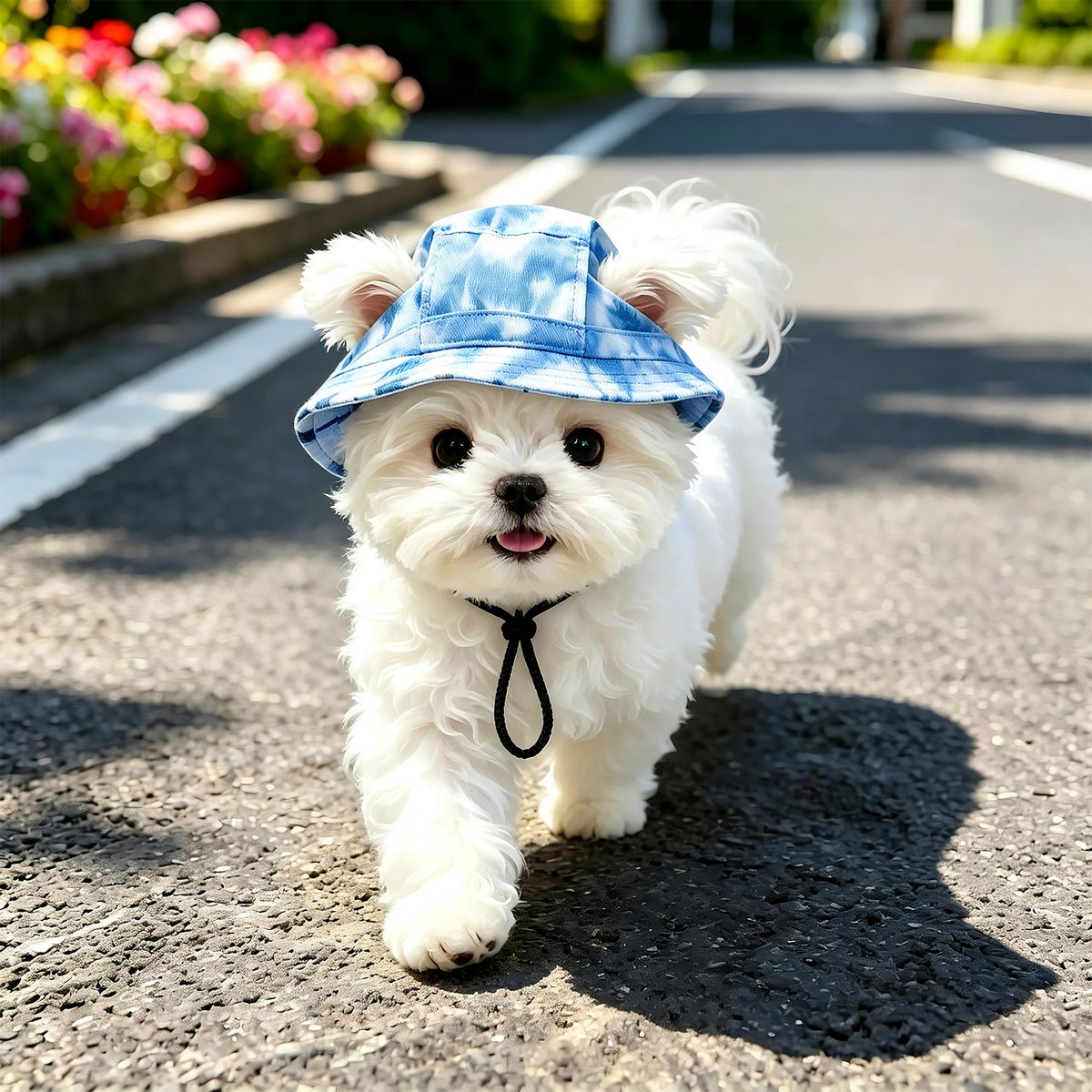 Pet bucket sun hat with ear holes and chin cord in brown cow print