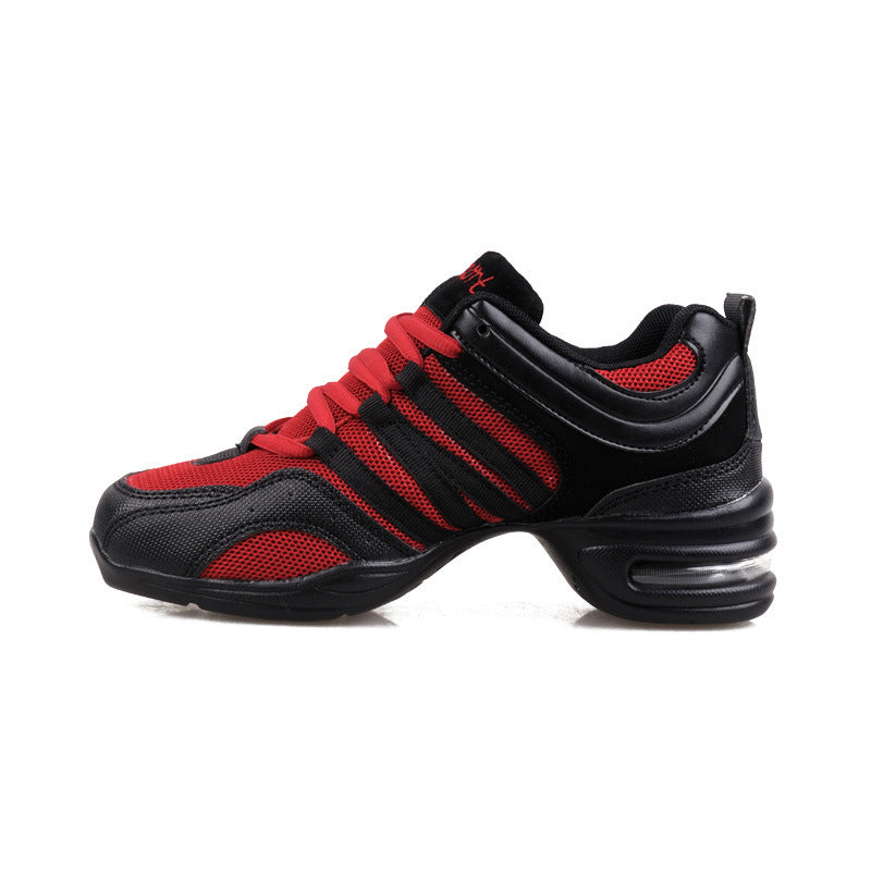 Black and red mesh dance sneaker with a thick sole and heel air cushion on a white background