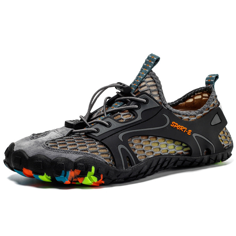 Five finger water sports shoe with a lug sole and toggle lace, side view