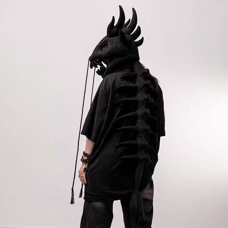Plush dinosaur skull costume hood with an open toothy jaw and a padded crystal velvet spine tail