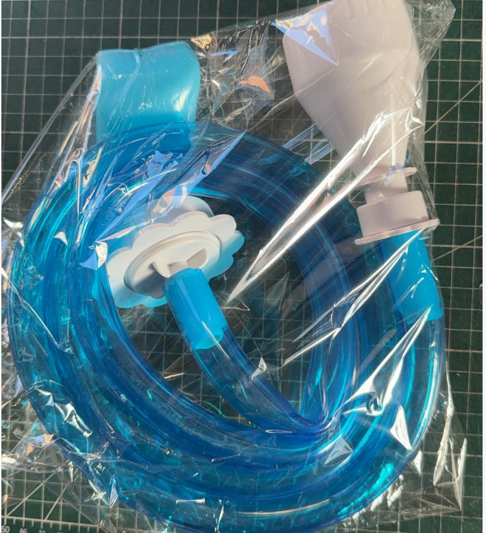 Pet shower hose connector held in a hand for scale reference