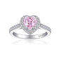 Front view of a heart pink stone halo ring on a slim S925 sterling silver pave band