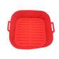 Reusable non stick silicone air fryer liner shown beside the air fryer drawer
