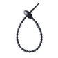 Tadpole silicone tie looped around a wrist to show how flexible the strap is