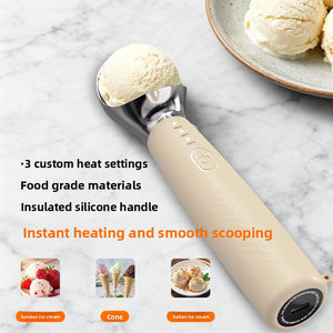 Beige heated ice cream scoop holding a vanilla ball, three heat setting lights on the handle