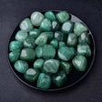 Green strawberry rolling stone