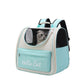 Green cat carrier backpack with a grey cat inside, clear dome and side mesh panel visible