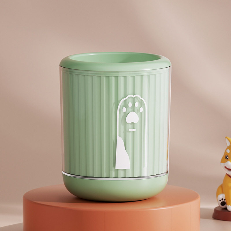 Green pet paw wash cup with a white paw print graphic, small size, on a studio pedestal